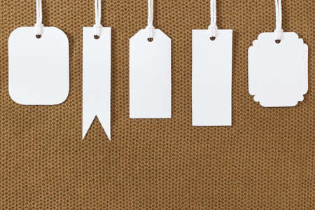 white blank tags label on fabric textureの写真素材