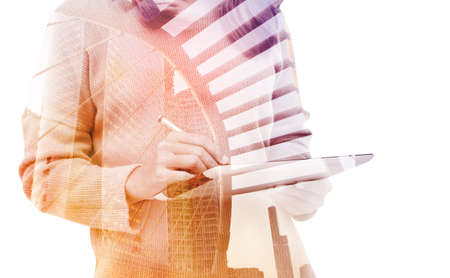 double exposure business woman using tablet  in city isolated with clipping path inside image data