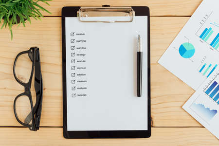 clipboad and check box on work desk business conceptの写真素材