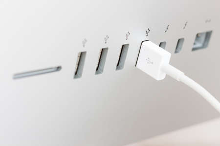 closeup usb cable connect to computer deviceの写真素材