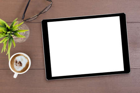 black tablet white screen on table top viewの写真素材