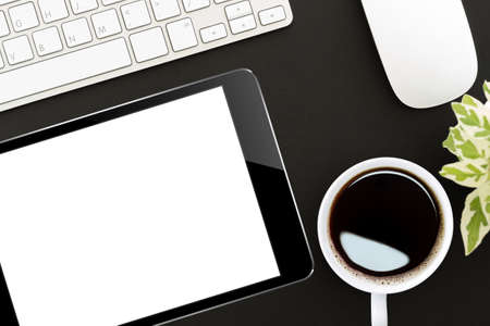 tablet digital on work desk top viewの写真素材