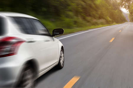 movement car speed on the road rural view backgroundの写真素材