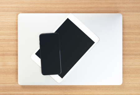 top view of communicator electronics device on tableの写真素材