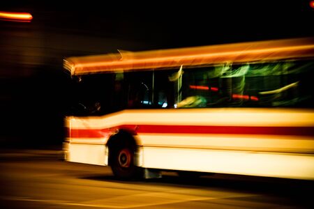 bus at night - public transportationの写真素材