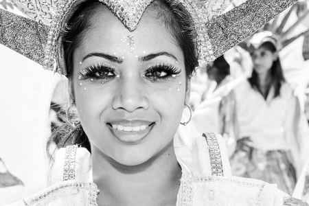Trinidad, West Indies - February 2, 2008 - Smiling female masquerader at the Junior Parade of the Bands festivities during Trinidad Carnival celebrations on February 2, 2008 in Port Of Spain, Trinidad W  I のeditorial素材
