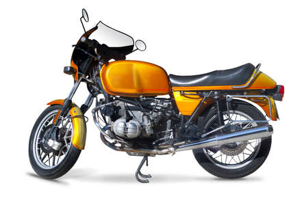 Orange classic German motorcycle isolated on whiteの写真素材