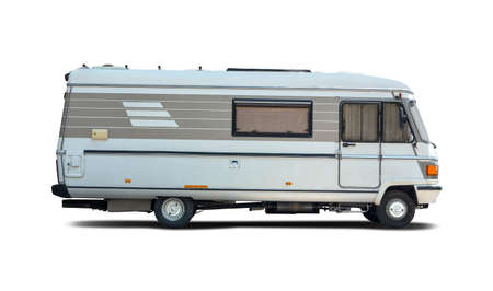 Old motorhome side view isolated on whiteの写真素材