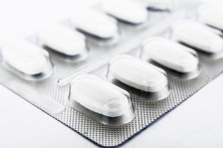 White pills in a blister packの写真素材