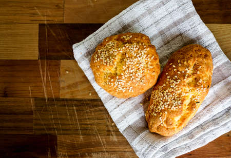 Low-carb gluten-free buns baked with sesame seeds