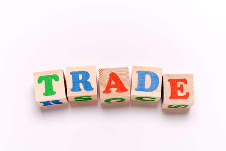 Wooden cubes with word TRADEの写真素材