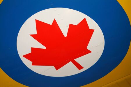 Closeup of the Royal Canadian Airforce roundel on the yellow wing of a training plane.の写真素材
