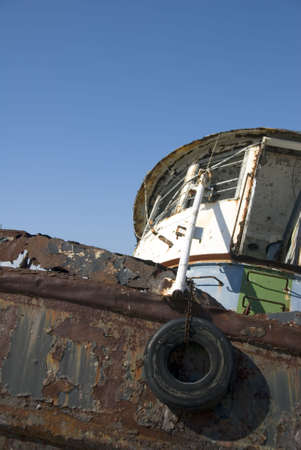 A beached tugboat rusting in the Caribbean.の写真素材