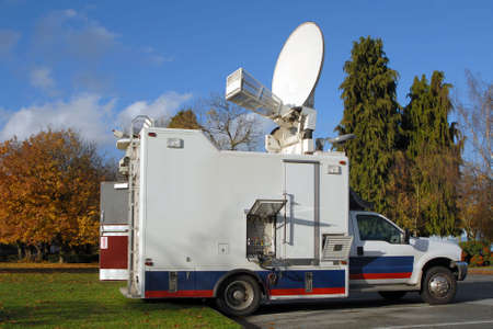 A North American TV news truck in the fall.の写真素材