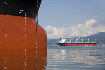 Two empty freighters anchored off the west coast of North America.の写真素材