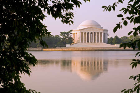 The Thomas Jefferson Memorial photographed across the Tidal Basin shortly after dawn.のeditorial素材