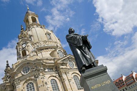 The statue of Martin Luther in front of the Frauenkirche in Dresden, Germany. The church was destroyed during the aerial bombing of the city that began on February 13, 1945. Reconstruction was completed in 2005.  の写真素材