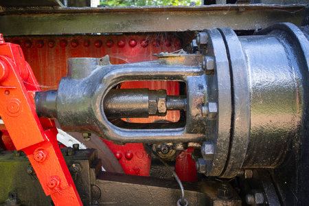 A black and red train engine with a red handle. The red handle is attached to a black and silver part of the engineの写真素材
