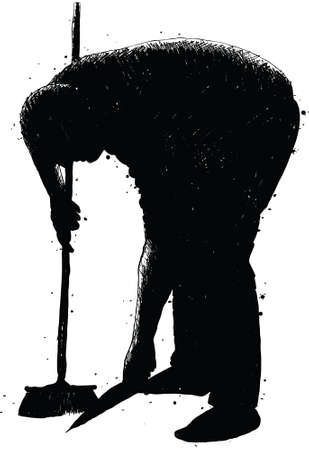 A silhouette of a man sweeping up with a broom の写真素材