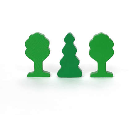 wooden green toy trees on white backgroundの写真素材