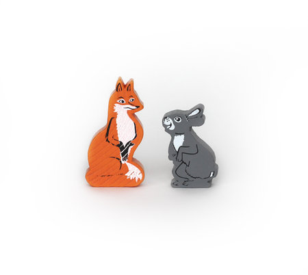 wooden childrens toys fox and hare on a white backgroundの写真素材