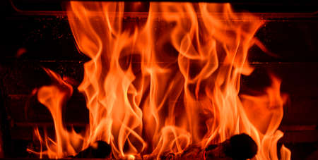 The flame of fire in the fireplace