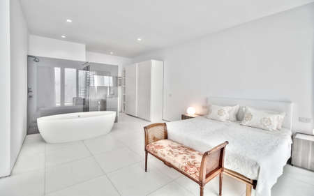 Modern white bedroomの写真素材