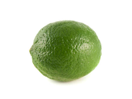 Isolated green lime on a white background. Fresh diet fruit. Healthy fruit with vitamins.