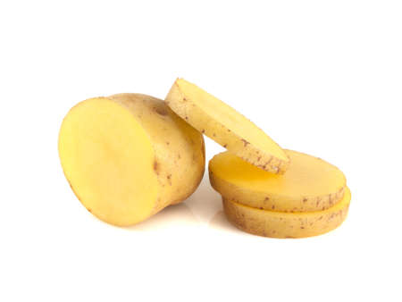 New potato half with slices isolated on white backgroundの写真素材