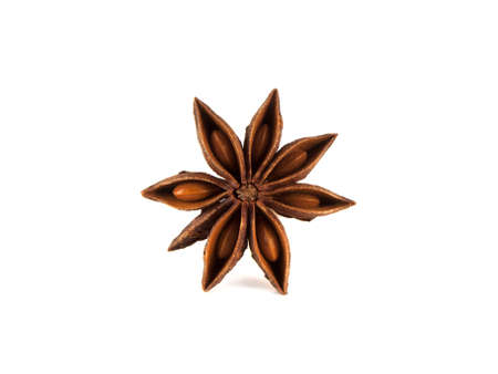 Whole anise star isolated on white background. Closeup top view of anise star.の写真素材