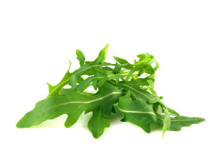 Arugula, rucola fresh heap leafs isolated on a white backgroundの写真素材