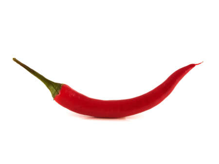 Red chili hot pepper on white background. Isolated healthy vegetable.の写真素材