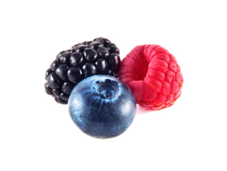 Fresh blueberry, raspberry and blackberry isolated on white background.の写真素材