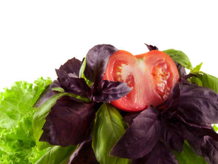 Salad mix with basil, lettuce, tomato. Purple and green basil. Isolated on white background.の写真素材