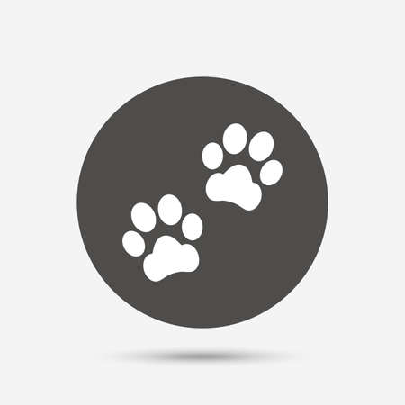 Paw sign icon. Dog pets steps symbol. Gray circle button with icon. Vectorのイラスト素材