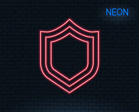 Neon light. Shield line icon. Protection or Security sign. Defence or Guard symbol. Glowing graphic design. Brick wall. Vectorのイラスト素材