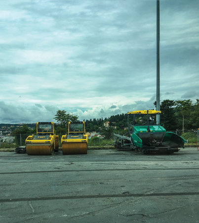 asphalting vehicles on the roadのeditorial素材