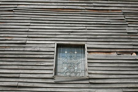 Wooden Wall exterior and protection steel windowの写真素材
