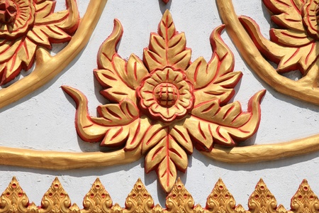 Ornament: Gold metal sculpture of flowers in Thai temple の写真素材