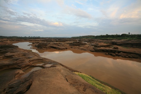 Travel background: natural islet and river scene at Sampanbok, Grand canyon in Thailand の写真素材