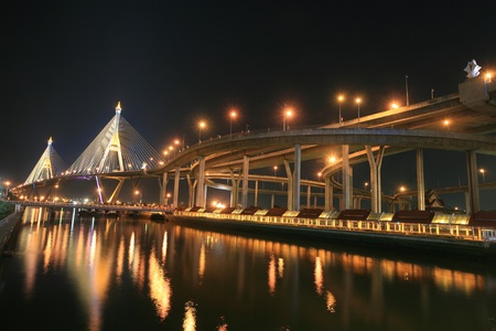 Night landscape of Bhumibol, aka Industrial Ring road, bridge in Bangkok, Thailand の写真素材