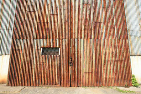 Background  zinc entrance of old factory の写真素材