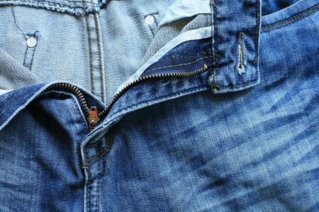 Textured pattern  unzipped men blue jeans の写真素材
