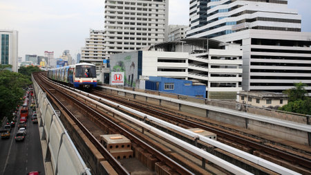 BANGKOK - JULY 07  BTS Skytrain on elevated rails above Phaholyothin Road on July 07, 2012 in Bangkok, Thailand  Each train can carry over 1,000 passengers to 32 stations around Bangkok and outskirts のeditorial素材