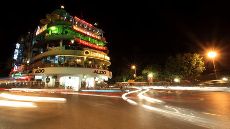HANOI- JUL 20  Light trails on Hang Duong street at the biggest trade centre near Hoan Kiem Lake and Dong Xuan night market on July 20, 2012 in Hanoi, Vietnam のeditorial素材