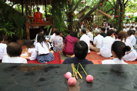 Lotus, incenses and candle for buddhism people to pray the monks at Wat Chonprathan Rangsarit in Nonthaburi, Thailandのeditorial素材