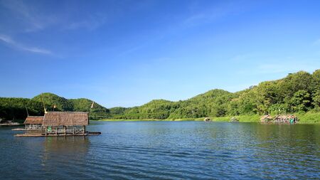 Bamboo rafts floating on the river against blue sky at Huai Krathing in Loei, Thailandの写真素材