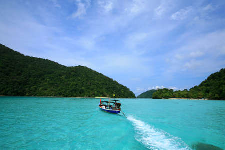 PHANG NGA, visitors on long tail boat are going to Surin islands national park in Phang Nga, Thailand の写真素材