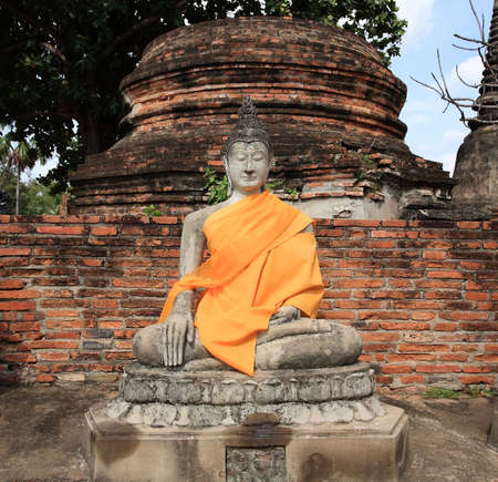 Ancient Buddha statue at Wat Yai Chai Mongkol in Ayuttaya, Thailand の写真素材