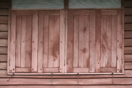 Old red wooden windows texture の写真素材
